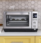 GE Convection Toaster Oven | Quartz Heating Technology | Large Capacity Toaster Oven Complete With 7 Cook Modes & Oven Accessories | Countertop Kitchen Essentials | 1500 Watts | Stainless Steel