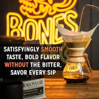Bones Coffee Company Bananas Foster, Banana, Rum and Vanilla Flavored Coffee, Medium Roast Low Acid Arabica Beans Compatible with Auto drip and French Press Coffee Maker, 12 Oz Ground