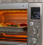 GE Convection Toaster Oven | Quartz Heating Technology | Large Capacity Toaster Oven Complete With 7 Cook Modes & Oven Accessories | Countertop Kitchen Essentials | 1500 Watts | Stainless Steel